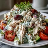 Bright Mediterranean flavors shine with feta, olives, and dill in this easy Tzatziki Chicken Salad, perfect for a light lunch.