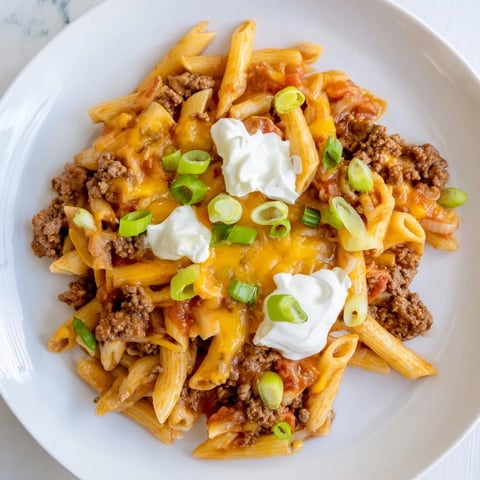 One-Pot Taco Pasta with melted cheese, perfect for a cozy, flavorful family dinner.