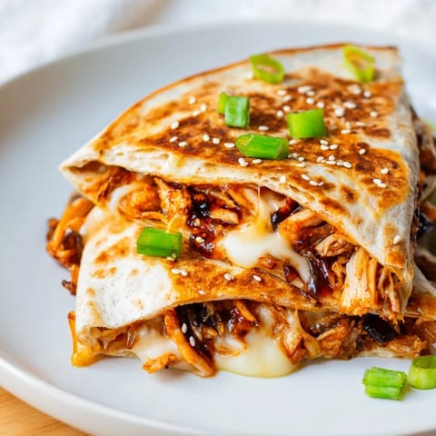 Deliciously grilled Korean BBQ Chicken Wrap Grilled Cheese, perfect for a satisfying lunch or dinner.