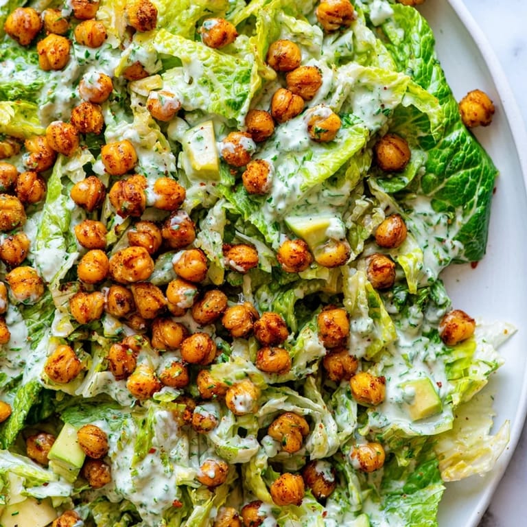 Fresh Green Goddess Salad with crispy, golden chickpeas, perfect for a light and flavorful lunch.