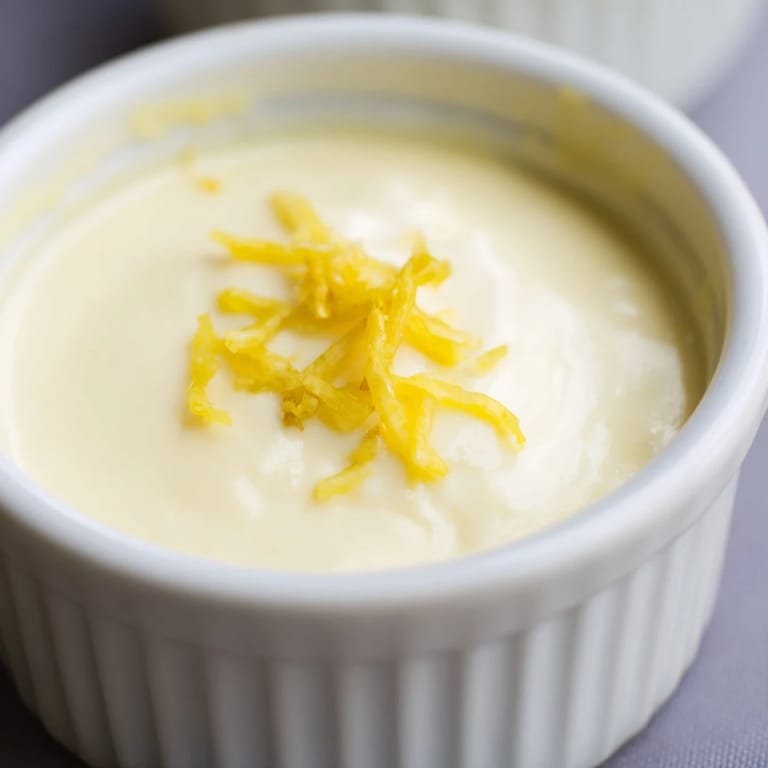 Perfectly set 3-Ingredient Lemon Posset with a delightful, silky texture ready for a refreshing treat.